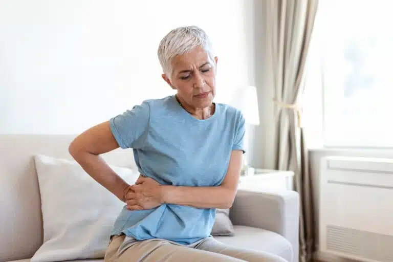 doctor conducting chiropractic care for patient with herniated disk